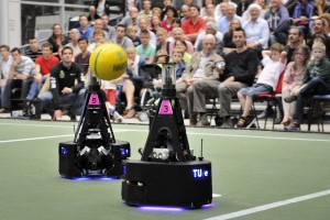 Middle Size League robots from Eindhoven University of Technology playing demonstration game.  Photo: Bart van Overbeeke